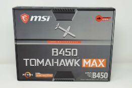 A pre-owned MSI B450 Tomahawk Max AMD AM4 ATX Motherboard (P/N: 911-7C02-019) (Boxed) (Untested,