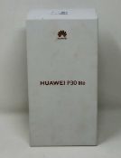 A boxed as new Huawei P30 Lite Dual SIM MAR-LX1A 128GB in Peacock Blue (Checkmend report ID: :