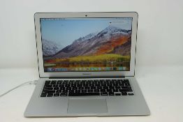A pre-owned Apple MacBook Air (13