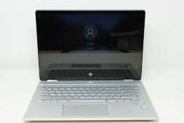 A pre-owned HP Pavilion x360 14-DH0002NP 14