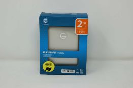 A boxed as new G-Technology 2 TB G-DRIVE Mobile USB Portable Hard Drive (Box sealed).