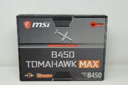 A pre-owned MSI B450 Tomahawk Max AMD AM4 ATX Motherboard (P/N: 911-7C02-019) (Boxed) (Untested,