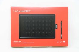 A boxed as new Wacom One Medium Graphics Tablet and Pen in Black & Red (Box sealed).