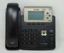 A boxed as new Yealink SIP-T23G Enterprise IP Phone in Black (Box opened, packaging states '