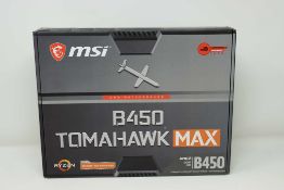 A pre-owned MSI B450 Tomahawk Max AMD AM4 ATX Motherboard (P/N: 911-7C02-019) (Boxed) (Untested,