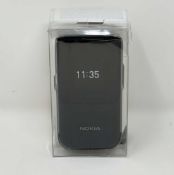 A boxed as new Nokia 2720 Flip TA-1173 SS 4G LTE in Black (Box sealed, some damage to packaging).