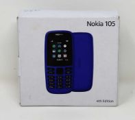A boxed as new Nokia 105 TA-1203 in Black (Box sealed).