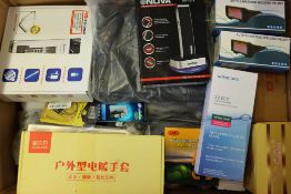 A box of assorted as new small electrical items and accessories.