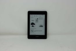 A pre-owned Amazon Kindle Paperwhite (PQ94WIF) E-Reader in Black.