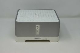 A pre-owned Sonos Connect Amp (Power cable included).
