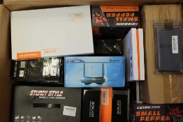 A box of assorted as new small electrical items and accessories.