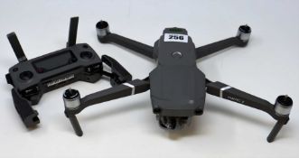 A pre-owned DJI Mavic 2 Pro Drone (damaged lens shield, damage to front body casing) with battery