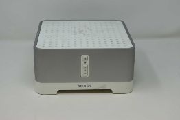 A pre-owned Sonos Connect Amp (Power cable included).