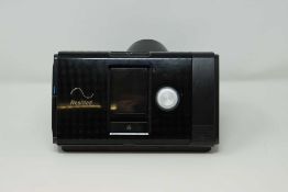 A pre-owned ResMed AirSense 10 AutoSet CPAP Machine (Power supply included).