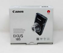 A boxed as new Canon IXUS 185 20MP 8x Zoom Compact Digital Camera in Silver.