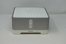 A pre-owned Sonos Connect Amp (Power cable included).