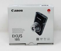 A boxed as new Canon IXUS 185 20MP 8x Zoom Compact Digital Camera in Silver.
