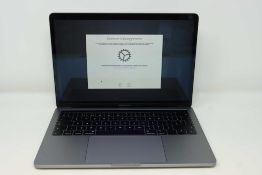 A pre-owned MacBook Pro 13