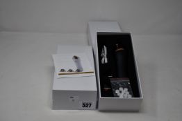 Two boxed as new handheld portable microdermabrasion tools.