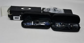 Two pairs of as new Oakley glasses to include OPH Tumbleweed (Matte Cement) and OPH Marshal (Satin