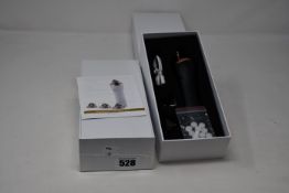 Two boxed as new handheld portable microdermabrasion tools.