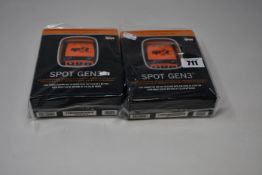 Two boxed as new Spot Gen3 Satellite GPS trackers.