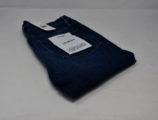 A pair of as new Frame Le Beau jeans in Burnside (Size 26).