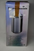 Two boxed as new Sensor dustbins in white.