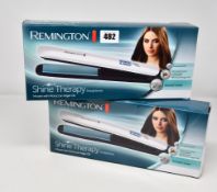 Five boxed as new Remington Shine Therapy Straighteners.