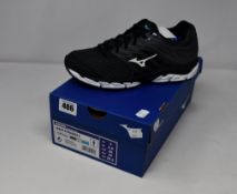 A pair of women's as new Mizuno Wave Paradox 5 running trainers (UK 6.5).