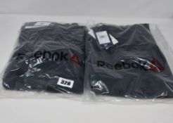 Seven pairs of as new Reebok TE textured logo sweatpants (2 x M, 5 x L).