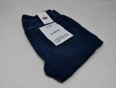 A pair of as new Frame Le Beau jeans in Burnside (Size 25).