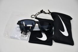 Two pairs of as new Nike Maverick sunglasses with pouches (RRP £74 each).