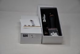 Two boxed as new handheld portable microdermabrasion tools.