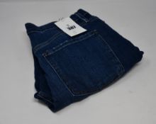 A pair of as new Frame Le Beau jeans in Burnside (Size 27).