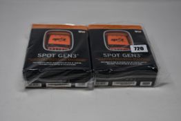 Two boxed as new Spot Gen3 Satellite GPS trackers.