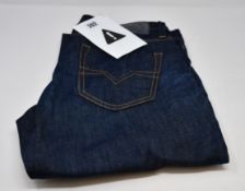 A pair of as new Diesel Larkee jeans (W32/L32).