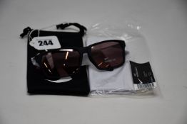 A pair of as new Nike Maverick RGE E sunglasses with protective pouch (RRP £137).
