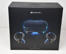 One boxed as new Oculus Rift S headset and controllers (VR headset, two touch controllers, 5m