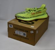 A pair of as new Adidas Yeezy Boost 350 V2 trainers (UK 11).