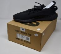 A pair of as new Adidas Yeezy Boost 350 V2 (UK 14).