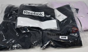 As new Reebok workout clothing; TE Linear Logo leggings (M), three TE Linear Logo bralettes (M),