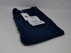 A pair of as new Frame Le Beau jeans in Burnside (Size 28).