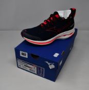 A pair of women's as new Mizuno Wave Rider Neo running trainers (UK 7.5).