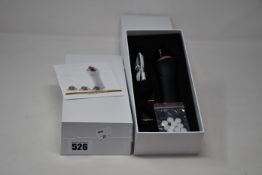 Two boxed as new handheld portable microdermabrasion tools.