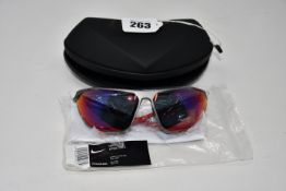A pair of as new Nike Stratus E sunglasses with case (RRP form £110).
