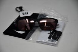 A pair of as new Nike Maverick RGE E sunglasses with protective pouch (RRP £137).