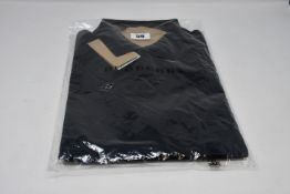 An as new Burberry Hartford polo shirt (XXL - RRP €139).