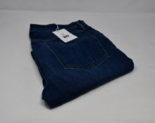 A pair of as new Frame Le Beau jeans in Burnside (Size 29).