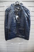 An as new Canson Denmark hi-tech down coat (Size 56).